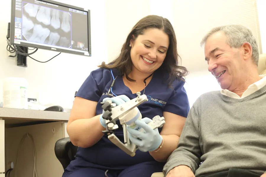 Dr. Regan reviewing options with a patient